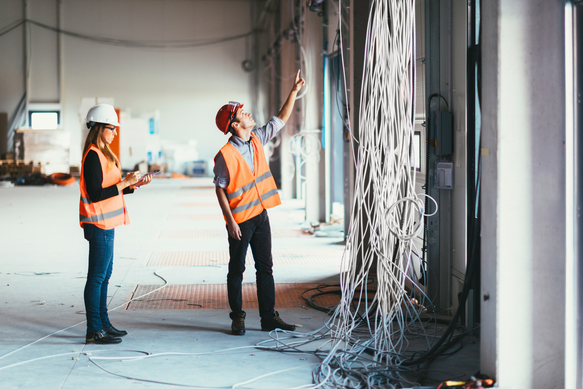 maintenance-engineers-checking-cables-2024-10-18-13-47-03-utc (1) commercial electrician